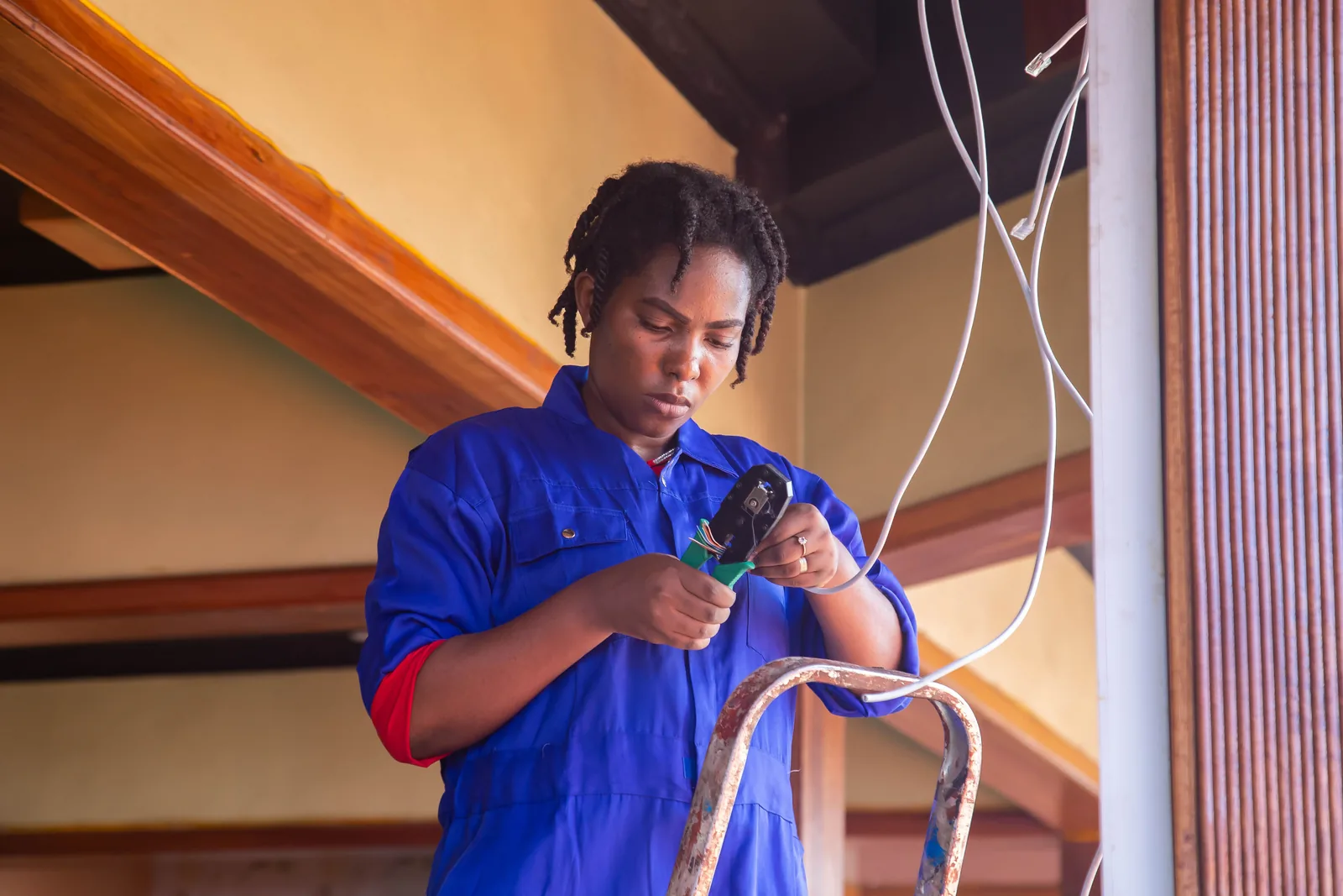 Terminating a cable from a step ladder, for code violation in Toronto