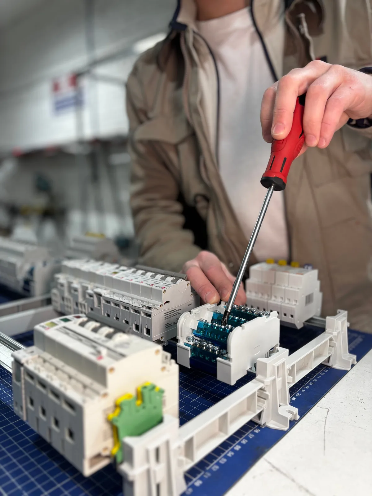 Breakers assembled on a DIN rail before installation, for subpanel installation in Toronto
