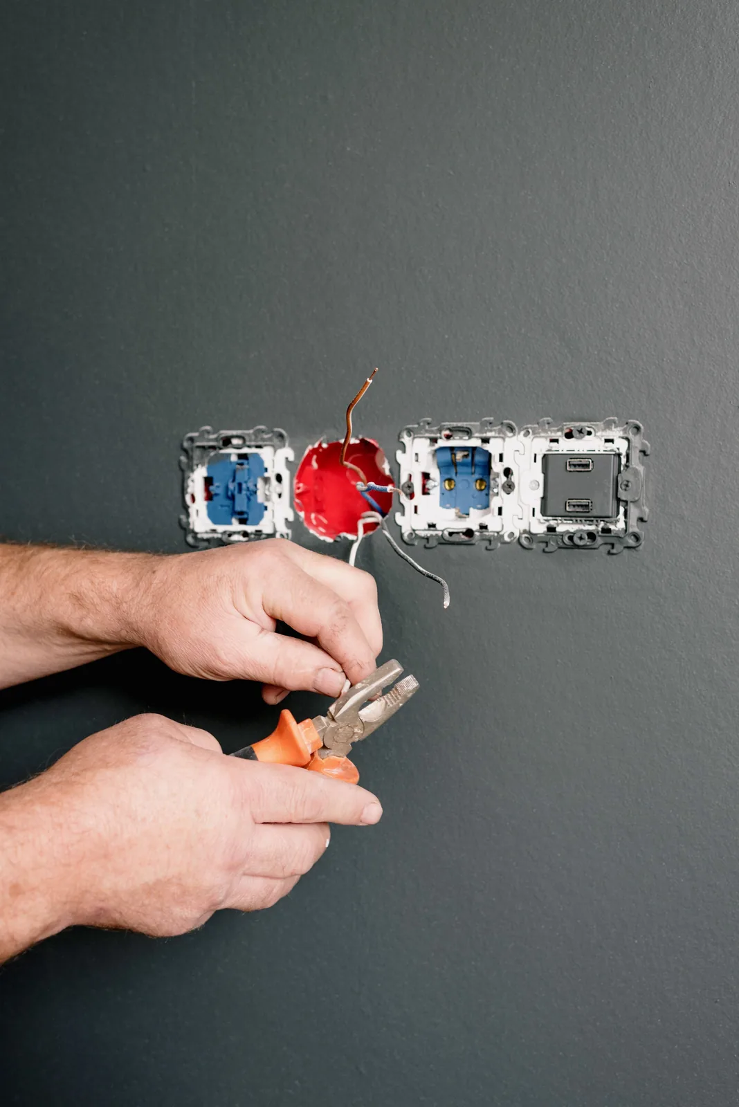 Wiring an outlet box into a finished wall, for code violation in Toronto