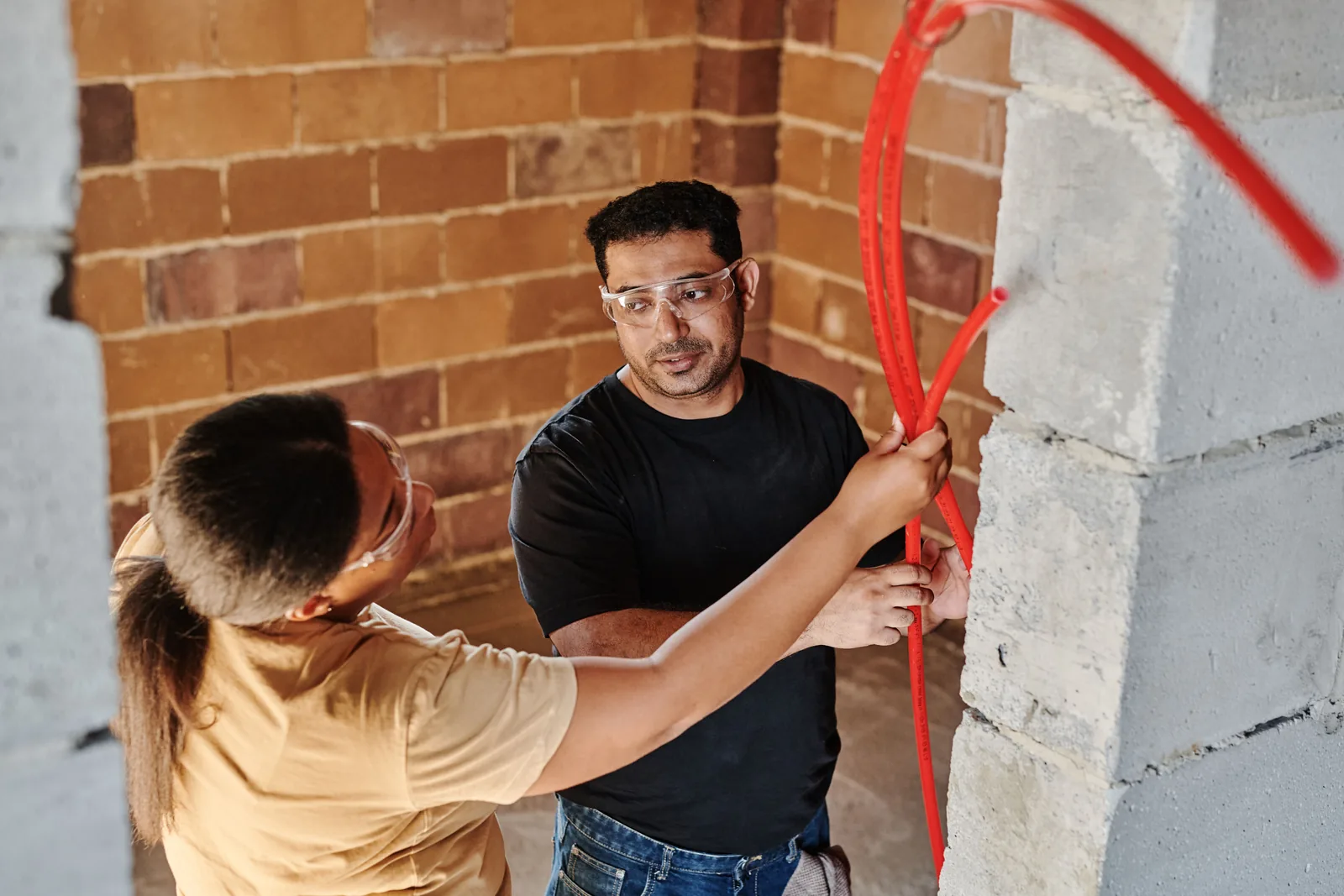 Running conduit across a block wall, for property management electrical in Toronto