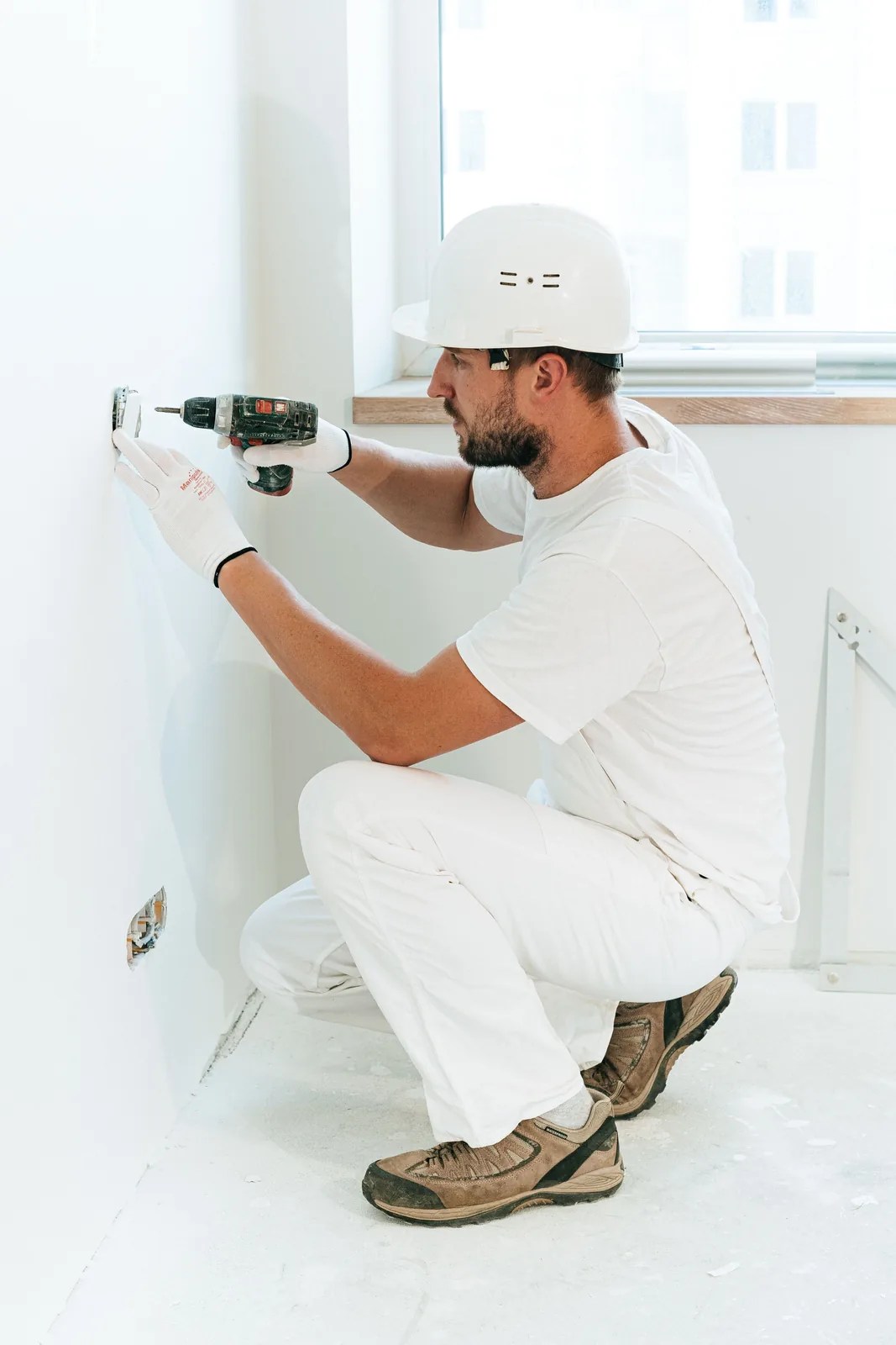 Fixing a socket into a finished wall, for electrician in Toronto